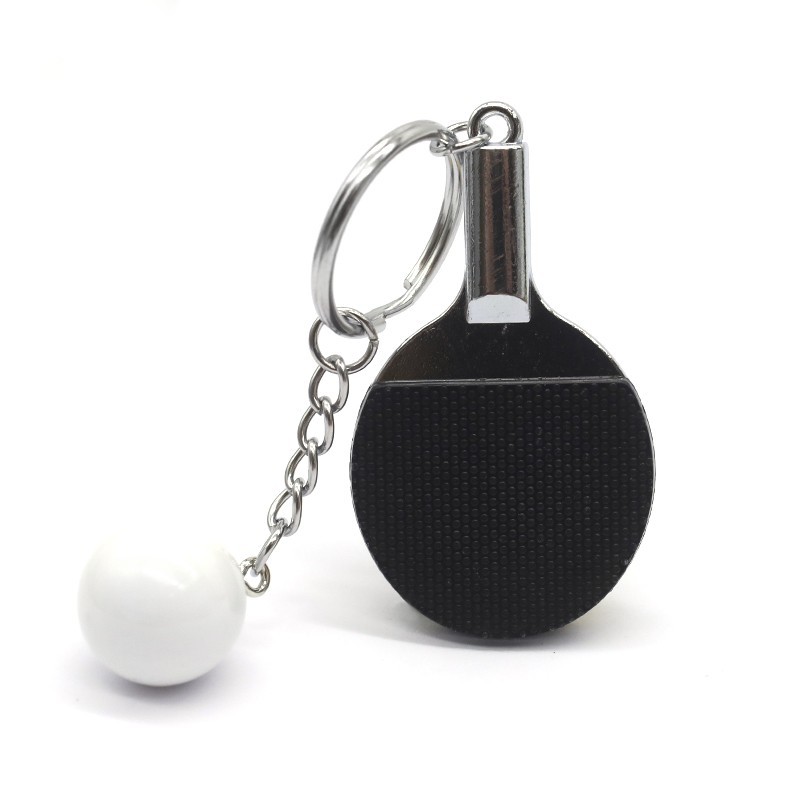 Llavero metálico "Mini Raqueta con la pelota" Llavero metálico "Mini Raqueta con la pelota"